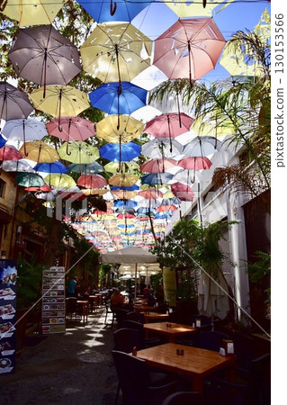 A cafe terrace in Cyprus in summer, decorated with colorful umbrellas 130153566