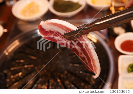 Korean BBQ. Charcoal grilled pork belly Korean BBQ. Charcoal grilled pork belly 130153655