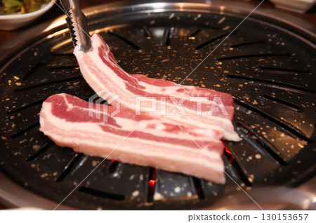 Korean BBQ. Charcoal grilled pork belly 130153657