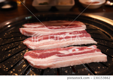 Korean BBQ. Charcoal grilled pork belly 130153662