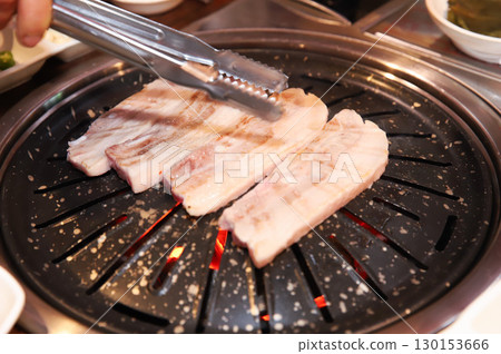 Korean BBQ. Charcoal grilled pork belly Korean BBQ. Charcoal grilled pork belly 130153666