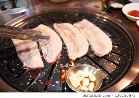 Korean BBQ. Charcoal grilled pork belly 130153672