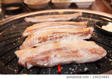 Korean BBQ. Charcoal grilled pork belly 130153683