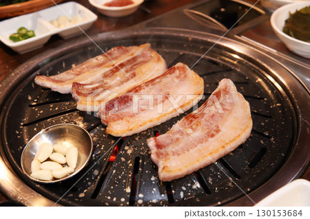 Korean BBQ. Charcoal grilled pork belly 130153684
