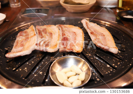 Korean BBQ. Charcoal grilled pork belly 130153686