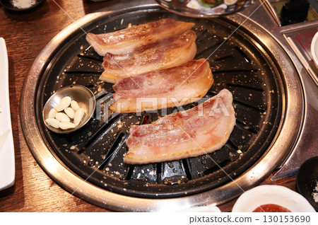 Korean BBQ. Charcoal grilled pork belly 130153690