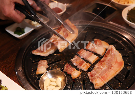Korean BBQ. Charcoal grilled pork belly 130153698