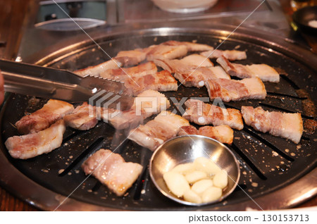 Korean BBQ. Charcoal grilled pork belly Korean BBQ. Charcoal grilled pork belly 130153713