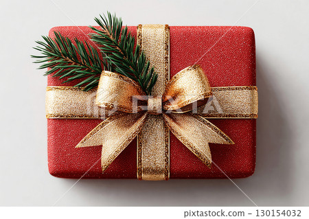Small pine sprig. Christmas Gift Box with a sprig of pine on white background. Christmas traditions and seasonal joy. 130154032