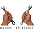 Two hands holding different types of wrenches. The left hand grips an open-end wrench 130154591