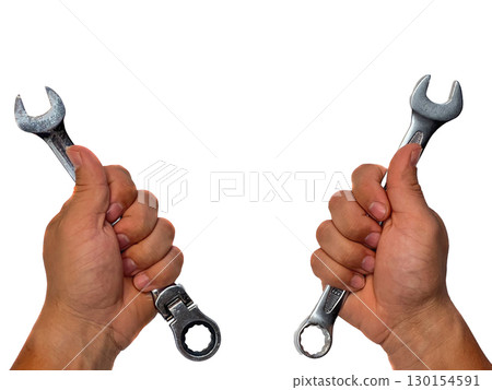 Two hands holding different types of wrenches. The left hand grips an open-end wrench Two hands holding different types of wrenches. The left hand grips an open-end wrench 130154591