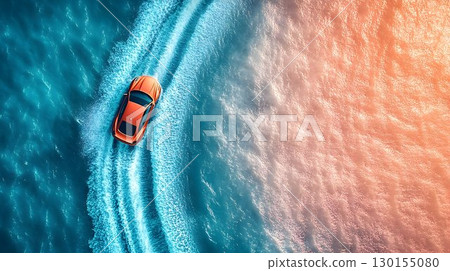 Aerial view of orange car speeding across turquoise water with s Aerial view of orange car speeding across turquoise water with s 130155080