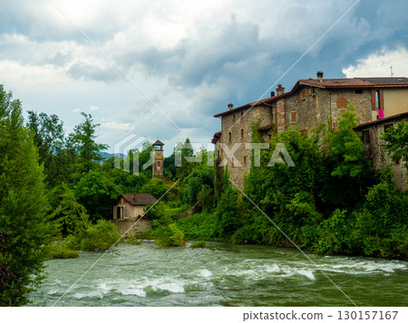Cityscape with river and village of Sabbio Chiese, Brescia, Italy 130157167
