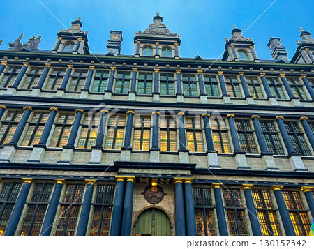 Historic city hall building of Ghent with staircase and arched windows, Belgium Historic city hall building of Ghent with staircase and arched windows, Belgium 130157342