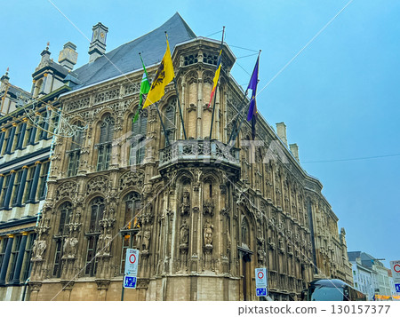 Historic city hall building of Ghent with staircase and arched windows, Belgium 130157377