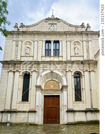 Ornate Church Facade with Columns and Sculptures. Saint Pietro in Oliveto, Italy Ornate Church Facade with Columns and Sculptures. Saint Pietro in Oliveto, Italy 130157420