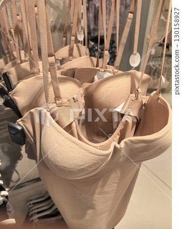 Lingerie display showcasing elegant and functional design in a boutique shop Lingerie display showcasing elegant and functional design in a boutique shop 130158927