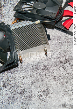 From above of vintage red CPU cooler also called PC cooling fan placed on surface 130158943