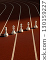 Chess pawns lined up on race track at starting line. Creative metaphor for challenge, leadership, and success 130159227