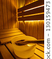Relaxing Wooden Sauna Interior, Wooden sauna interior with pebbles in a wooden box 130159473