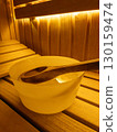 Relaxing Wooden Sauna Interior, Wooden sauna interior with pebbles in a wooden box 130159474