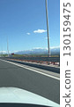 picturesque mountain road, mountain peaks in snow, clouds. clouds. Travel in Poland, High Tatras 130159475