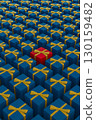 Red gift box among blue and yellow boxes, standout concept, Symbol of individuality, contrast and uniqueness 130159482