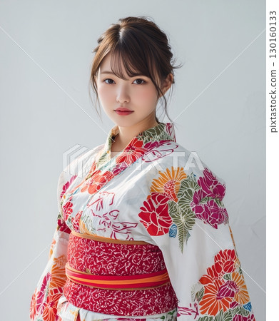 Japanese woman wearing a vibrant yukata 130160133