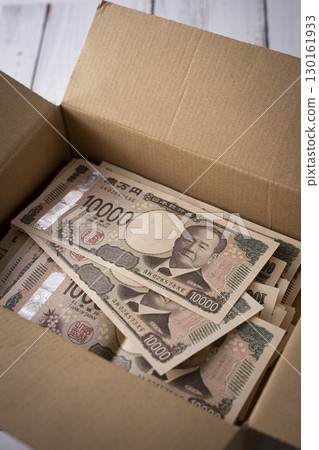 10,000 yen bills in a cardboard box 1 million yen 10,000 yen bills in a cardboard box 1 million yen 130161933