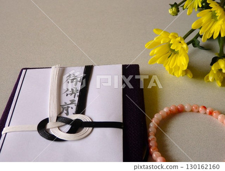 Chrysanthemum flowers and Buddhist items Chrysanthemum flowers and Buddhist items 130162160