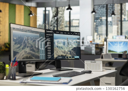 PC in empty office used to research next generation wind turbine technologies, accelerating clean energy adoption. Computer in RD workspace used to optimize aerodynamic design of VAWT turbine 130162756