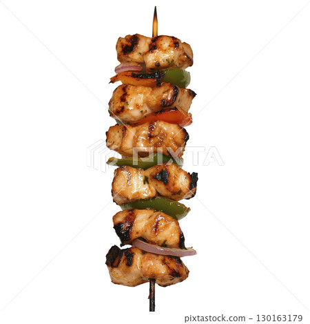 A Grilled chicken skewer with vibrant vegetables, including green peppers and red onions, showcasing delicious and appetizing barbecue treat 130163179