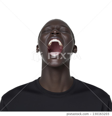 A person with joyful expression is captured mid laugh, showcasing sense of happiness and freedom. image focuses on open mouth and expressive face, highlighting emotion 130163203