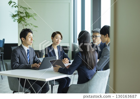 Business people having a meeting 130163687