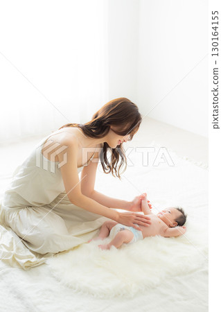 Baby and mother 130164155