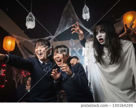 Japanese high school girls have fun at school festival Halloween party! They scare their friends with horror-themed makeup 130164289