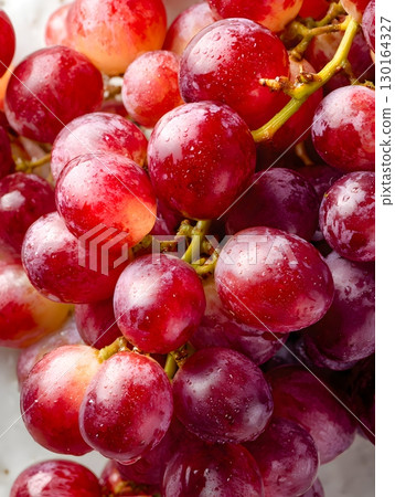 Close-up of fresh grapes with water droplets 130164327