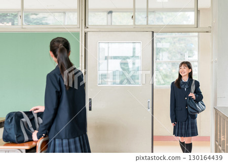 Smiling elementary school, junior high school, and high school girls going to school in classrooms 130164439