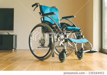 Wheelchair in the living room 130164451