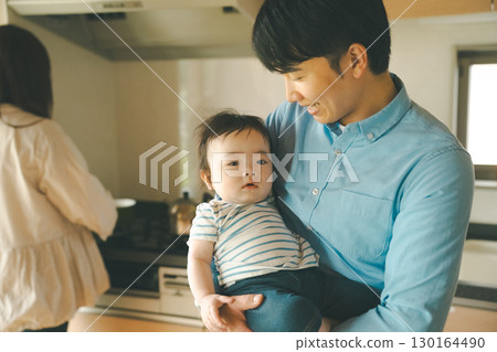 a cuddle, child-raising, parenting 130164490