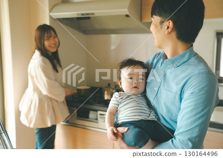 a cuddle, child-raising, parenting 130164496