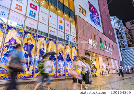 Tokyo cityscape, Japan. Akihabara is bustling with young people and foreign tourists even late at night = 7:54 p.m. Tokyo cityscape, Japan. Akihabara is bustling with young people and foreign tourists even late at night = 7:54 p.m. 130164809
