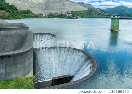 Flow of the Aodo Dam with two spillways in Koka City, Shiga Prefecture Flow of the Aodo Dam with two spillways in Koka City, Shiga Prefecture 130166323