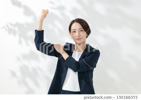 A woman doing a guts pose 130166355