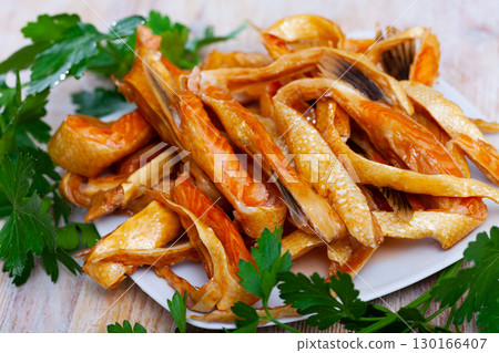 Smoked salmon bellies with greens Smoked salmon bellies with greens 130166407