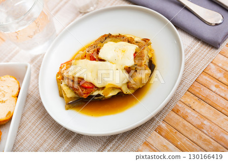Eggplant with tomato, minced meat and cheese Eggplant with tomato, minced meat and cheese 130166419