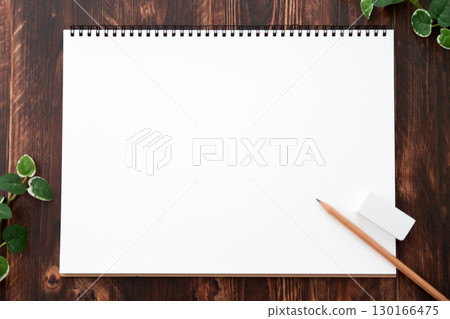 Sketchbook, pencil and eraser 130166475