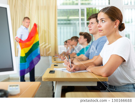 Girl student listening to teacher talking about LGBT in class 130166688