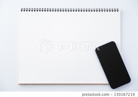 Sketchbook and smartphone 130167219