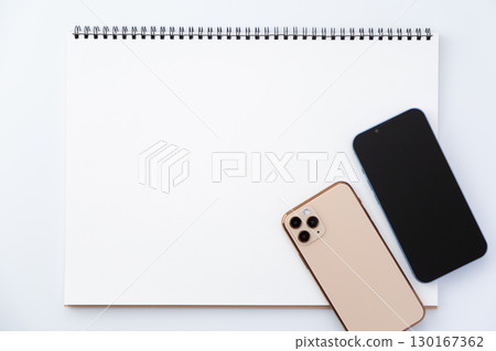 Sketchbook and smartphone 130167362